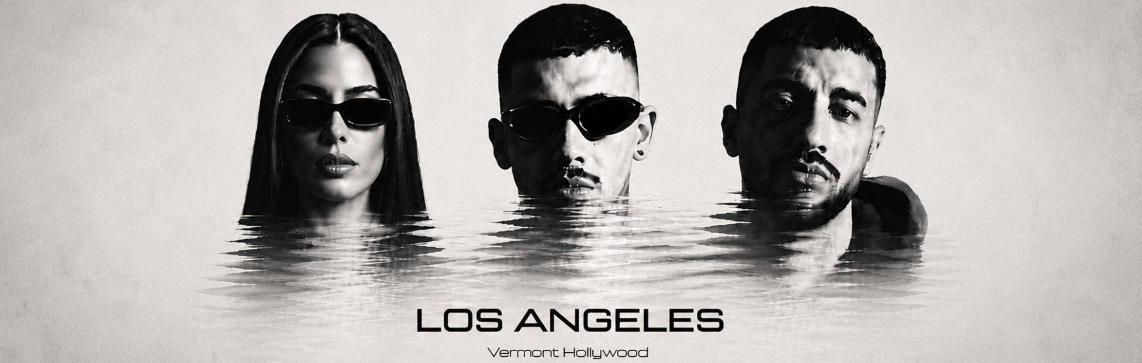 Black-and-white promo image of three people with sunglasses, water up to their chins, with 'LOS ANGELES' text beneath.